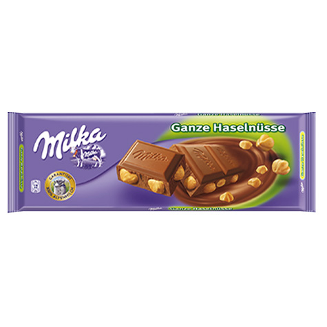Milka chocolate bar with nuts on a purple packaging